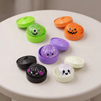 Squishies raviolis d'Halloween dans leurs paniers vapeur colorés (orange, vert, noir, violet)