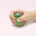 Squishy Axolotl extensible en main d'enfant