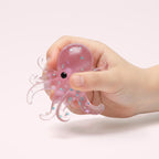 Squishy Pieuvre de l'océan en main d'enfant