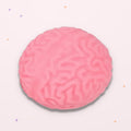 Squishy Cerveau de zombie rose sur fond rose