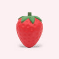 Squishy géant fraise slow rising, packshot sur fond rose clair