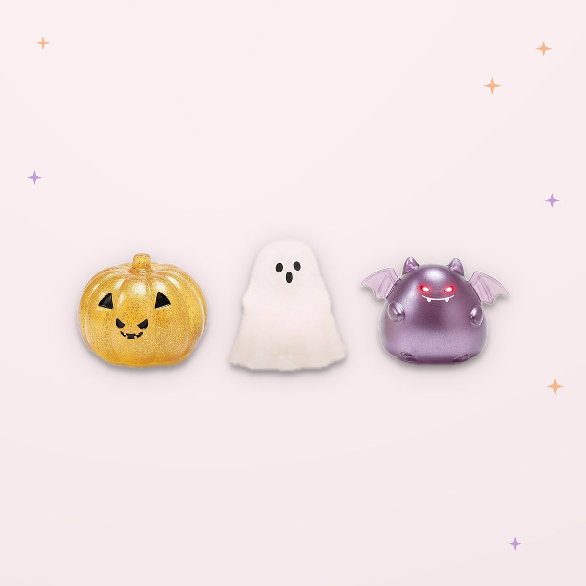 Squishies Halloween lumineux : citrouille, fantôme et chauve-souris, fond rose
