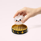 Squishy Ravioli d'Halloween brillant – en main