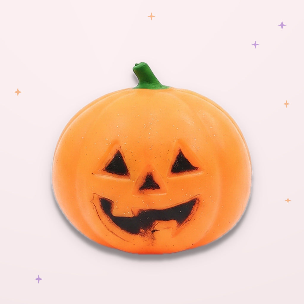 Squishy Tête de Citrouille d'Halloween sur fond rose