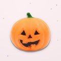 Squishy Tête de Citrouille d'Halloween sur fond rose