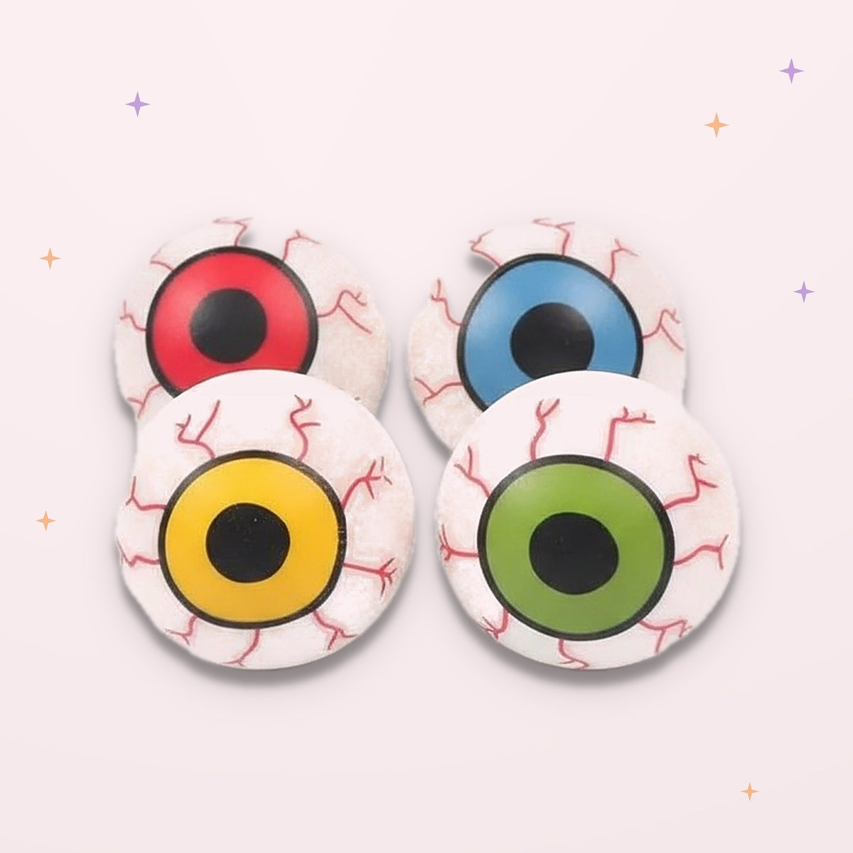 Squishies Yeux d'Halloween, 4 couleurs, sur fond rose